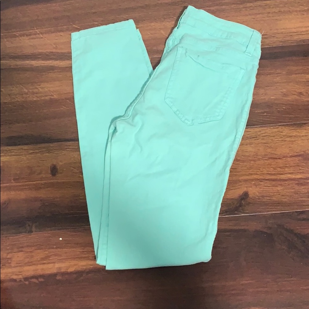 Green skinny jeans size 7